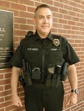 Ellijay Police Chief Edward Lacey wears the external body armor the police department will be phasing in as their existing concealed body armor reaches its replace date. 