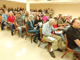 Seats in the courthouse jury assembly room filled up quickly for Thursday’s Gilmer County Planning Commission meeting, at which rezoning requests for a cryptomining facility and a multifamily housing development were heard.